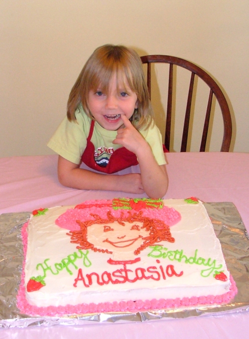 A with birthday cake age 4